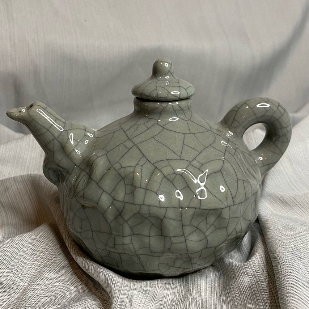 Gray ceramic glazed teapot.